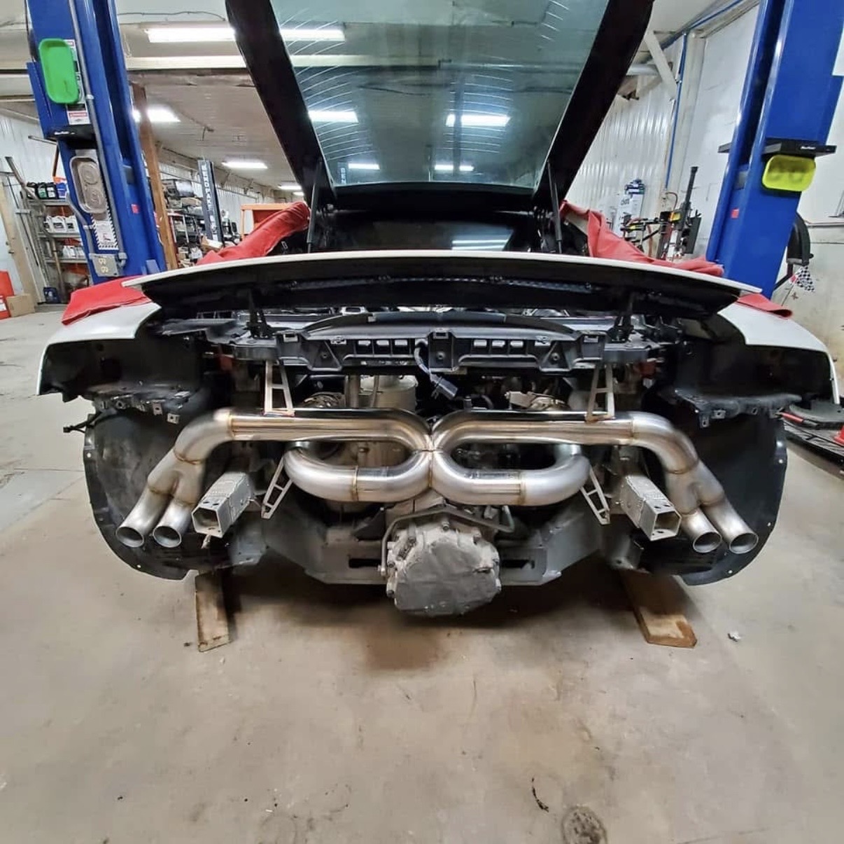 Custom exhaust fabrication on a supercar